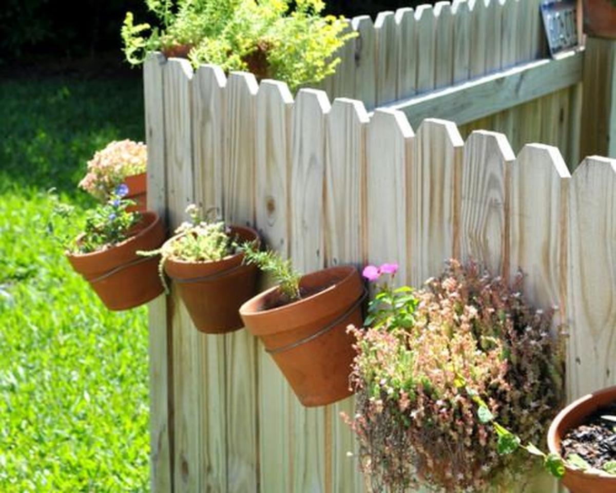 Flowerpots on Fence